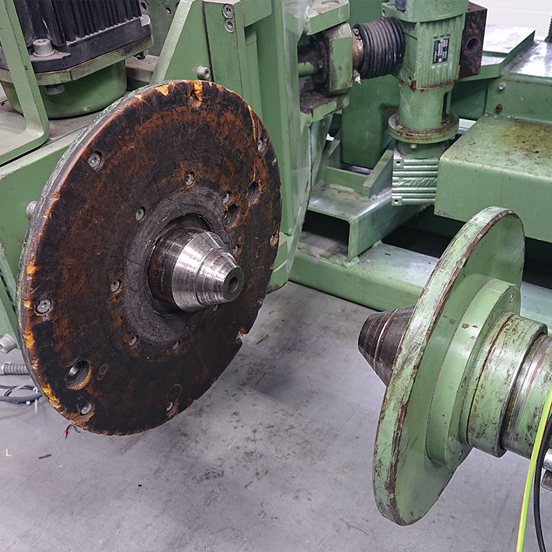 Old rewinder with worn friction disk and pintle